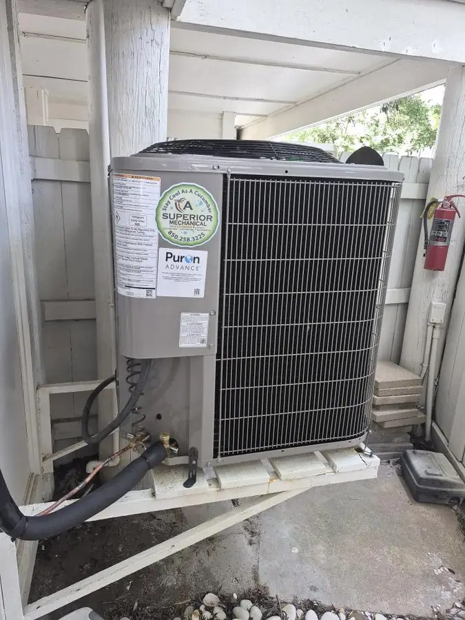 A newly replaced AC condenser at a Santa Rosa Beach home